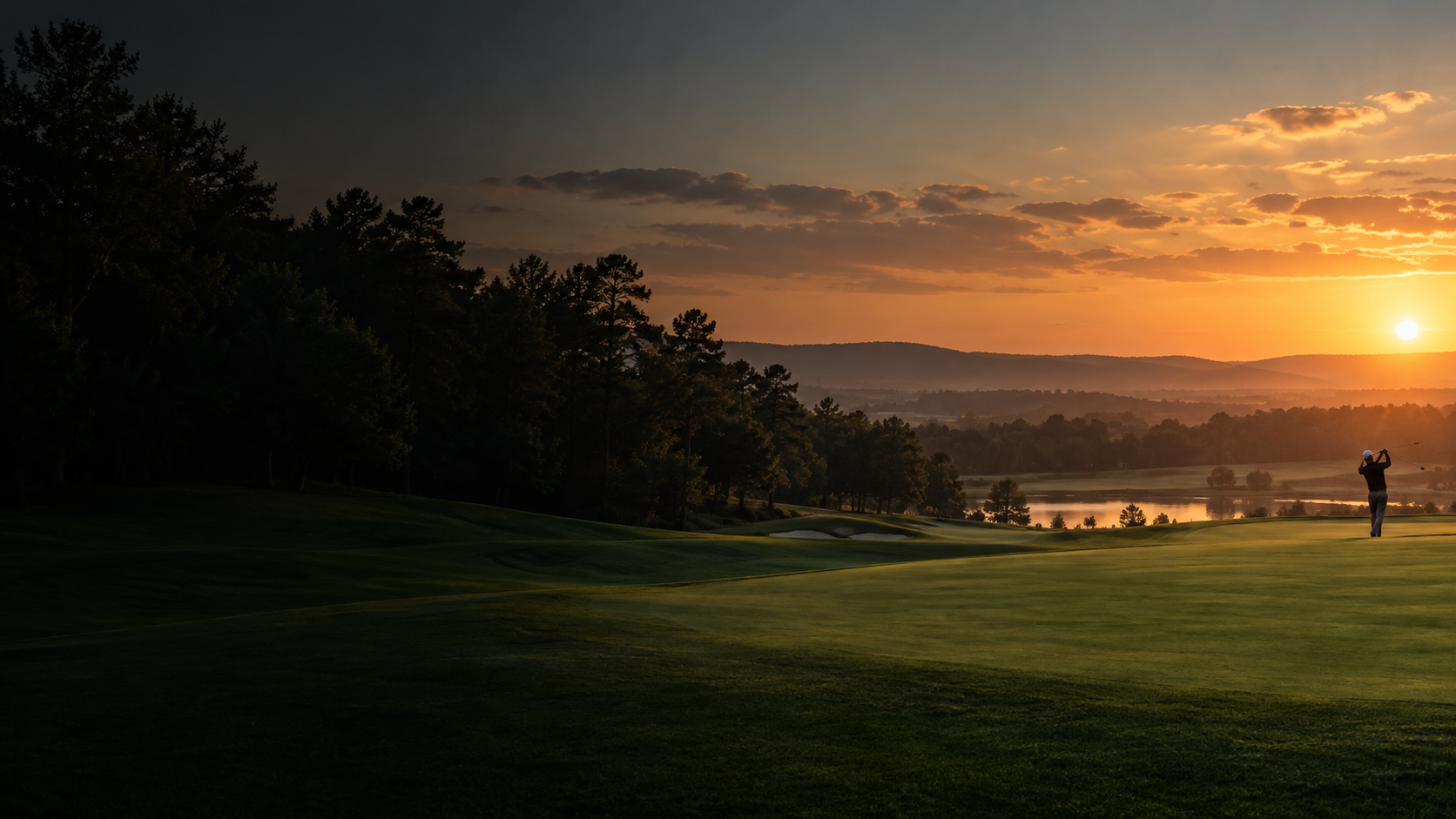 A golf course at sunset